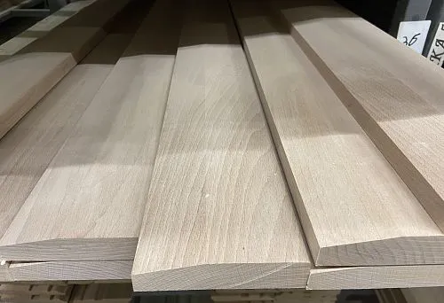 MDF skirting boards with smooth surface, ready for installation in a modern interior
