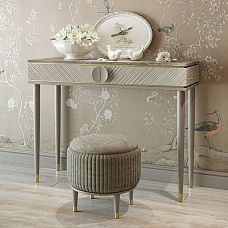 Turned furniture leg with metal decoration for a table and chair