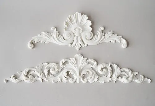 Two elegant polyurethane decorative elements with classic scrolls