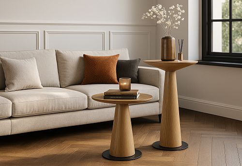 Modern living room interior with beige sofa, decorative pillows and wooden tables in minimalist style