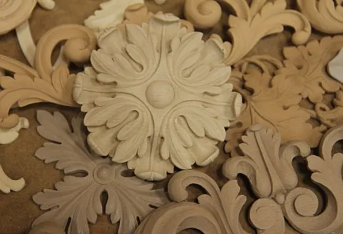 Decorative wooden appliqu&eacute;s &mdash; classic ornament for decorating walls and furniture.