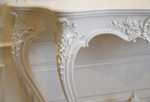 Detailed view of carved console elements