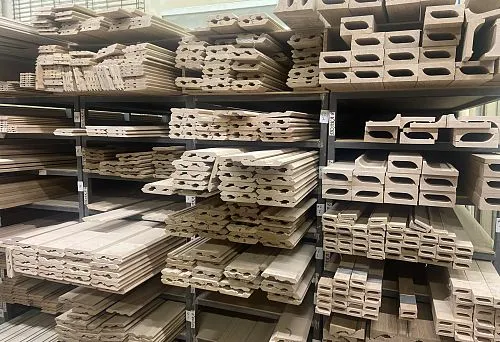 Decorative Solid Wood Boards on Shelves in the Workshop.
