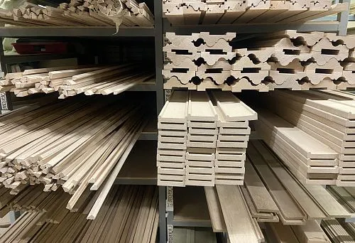 Storage with wooden siding and solid wood trim elements