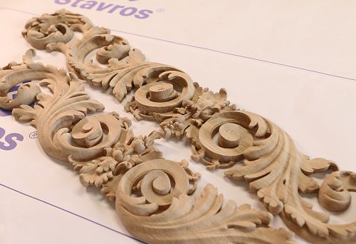Carved wooden trimmings with classic ornament in oak