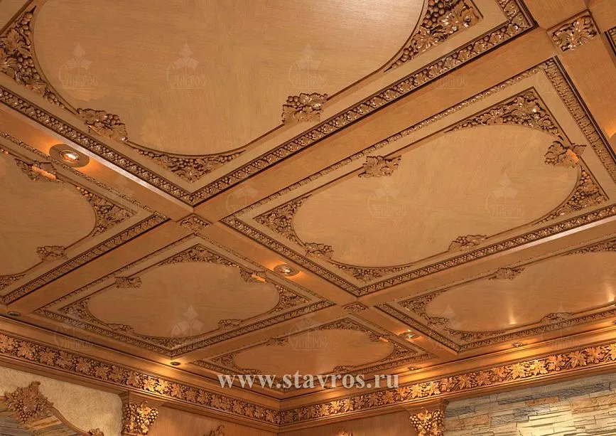 Wooden coffered ceiling with carved inserts