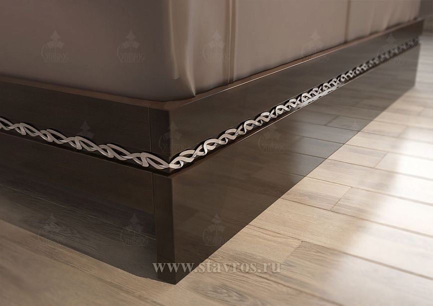 Decorative carved insert in the base of the KRV-008 bed