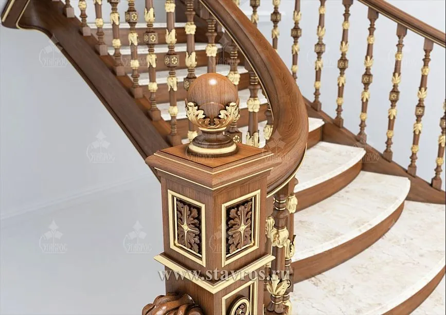 Curved handrails of the RLE-012 staircase with gilded elements and carved patterns