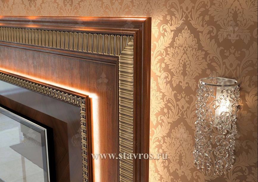 Close-up of decorative molding with gold on wooden TV frame