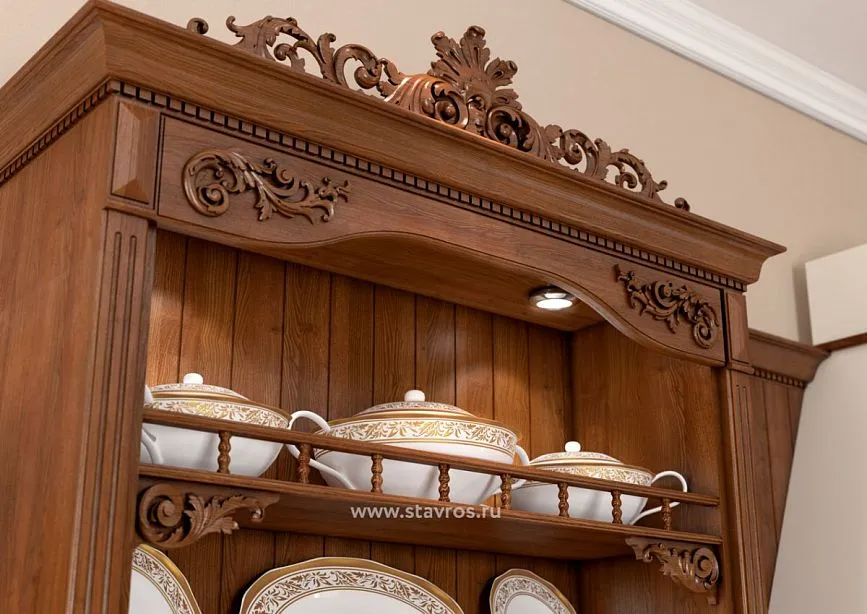 Decorative carving on the upper cabinets of the KUH-015 kitchen