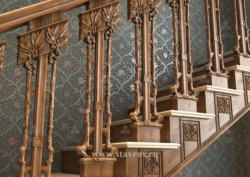 Carved balusters and stringers of staircase RLE-061, adorned with three-dimensional patterns.