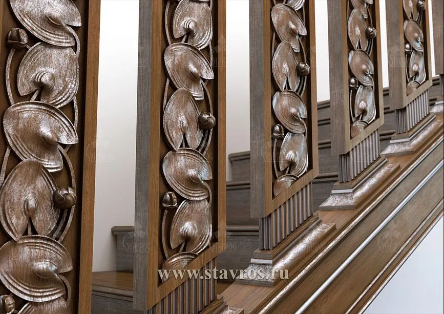 Massive carved posts of the RLE-018 staircase with decorative fluted elements